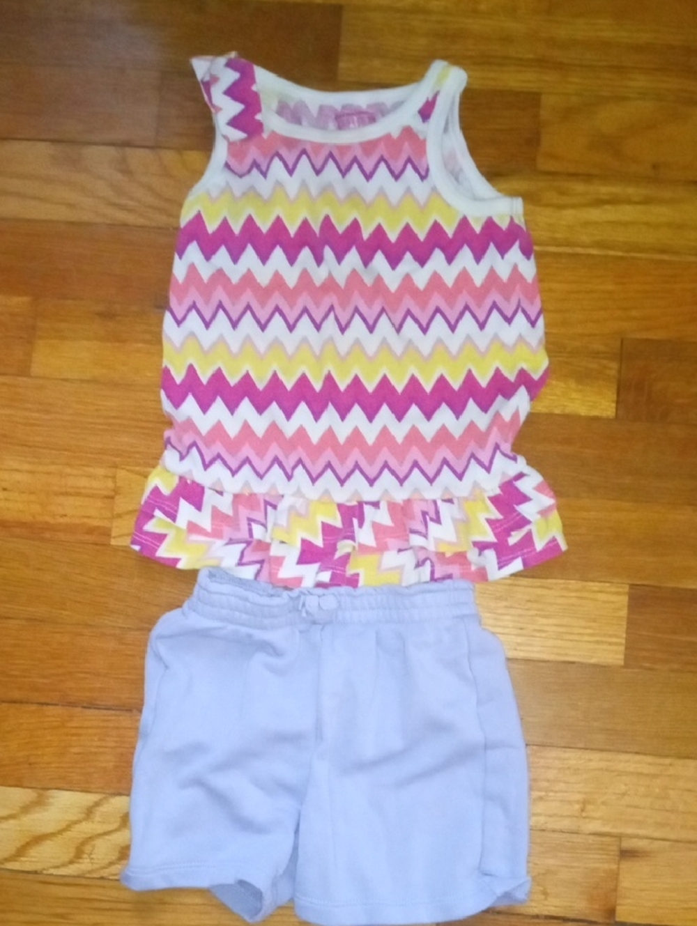 girl 4 zig zag print tank and purple shorts